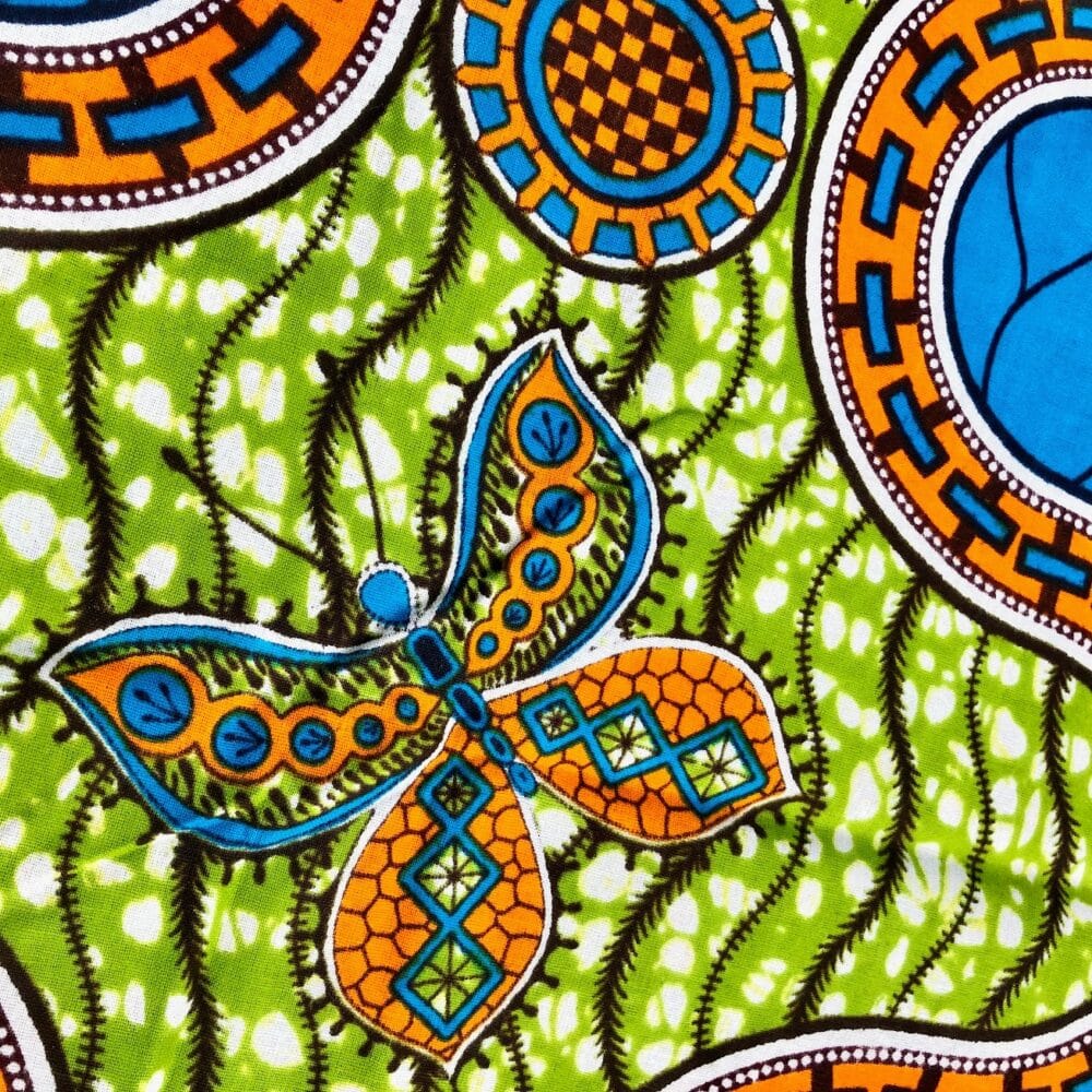 Tissu Wax réversible anis orange imprimé Papillon détail verso