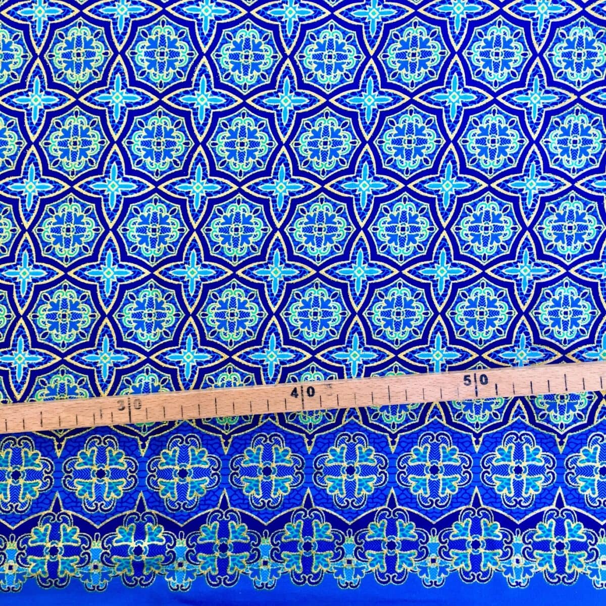 Tissu Wax pailleté bleu imprimé Tuiles