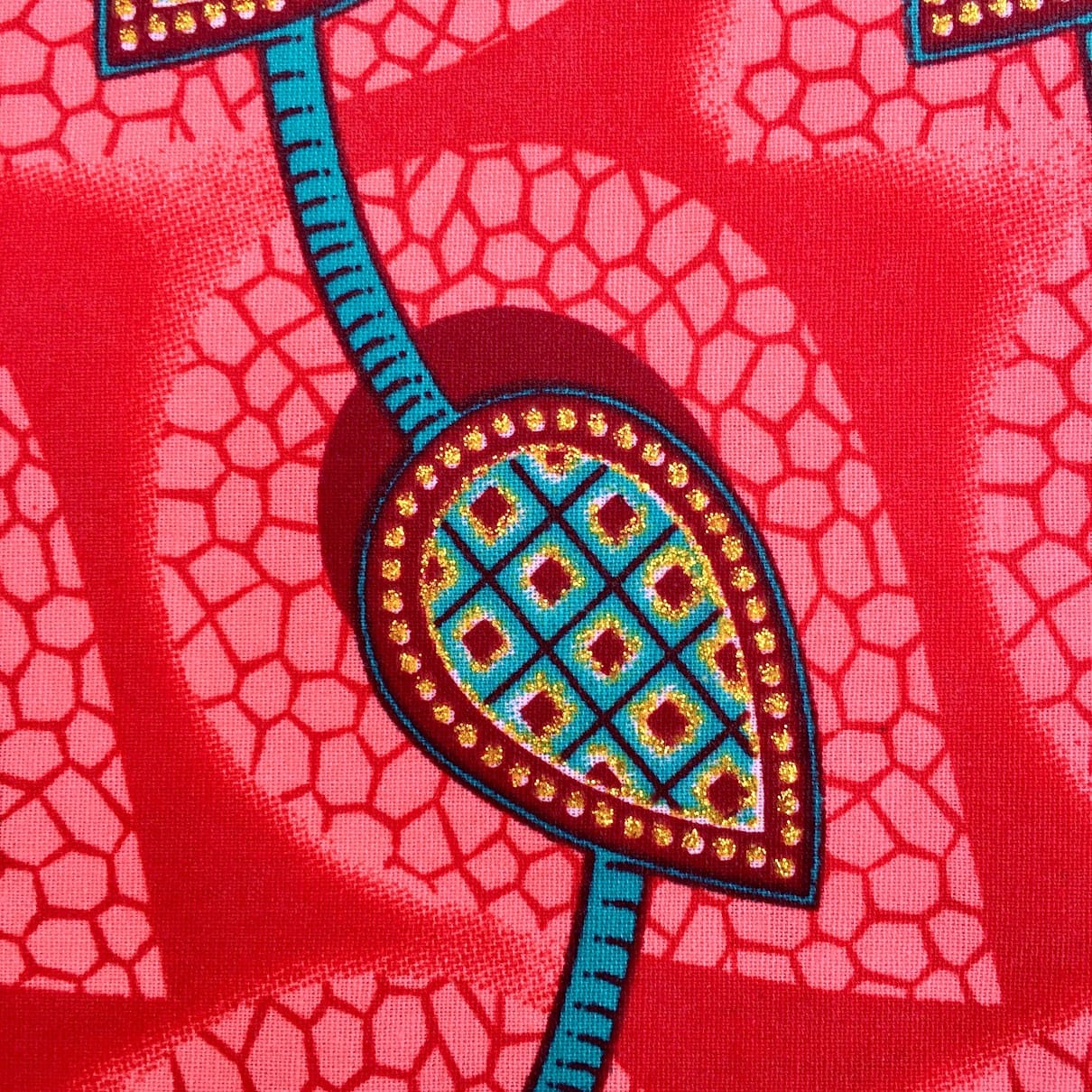 Tissu Wax pailleté corail imprimé Tulipes détail