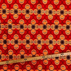 Tissu Wax pailleté rouge orange imprimé Fleurs