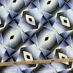 Tissu Wax pailleté noir imprimé Oeil