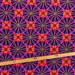 Tissu Wax pailleté violet orange imprimé Circus
