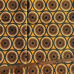 Tissu Wax pailleté jaune orangé imprimé Rosaces