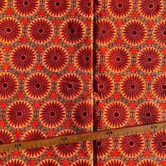 Tissu Wax pailleté orange imprimé Rosaces