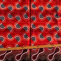 Tissu Wax pailleté rouge imprimé Courbes