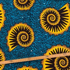 Tissu Wax vert jaune imprimé Fossile