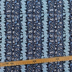 Tissu Wax pailleté gris bleuté imprimé Crotale