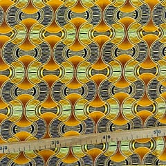 Tissu Wax pailleté jaune orangé imprimé Tambour