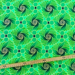 Tissu Wax pailleté vert imprimé Soleil