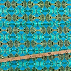 Tissu Wax pailleté vert turquoise imprimé Tambour