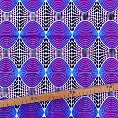 Tissu Wax pailleté bleu fuchsia imprimé Seventies