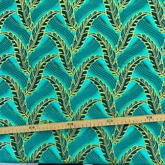 Tissu Wax pailleté vert imprimé Plumes