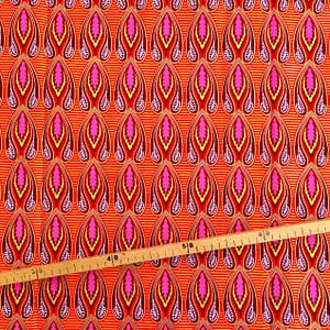 Tissu Wax pailleté rouge imprimé Flammes