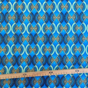 Tissu Wax pailleté bleu turquoise imprimé Demi-lunes