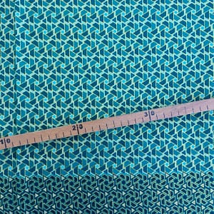 Tissu Wax pailleté vert imprimé Mini triangles