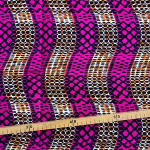 Tissu Wax orange fuchsia imprimé Routes