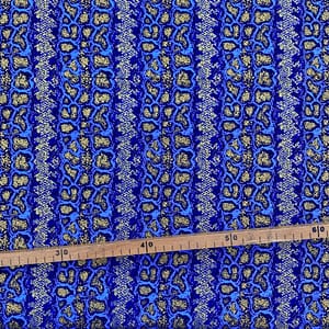 Tissu Wax pailleté bleu imprimé Crotale