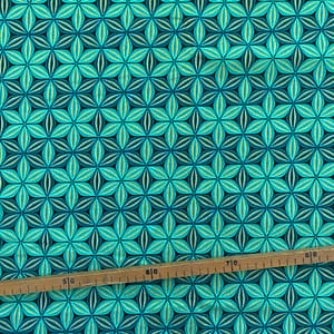 Tissu Wax pailleté turquoise imprimé Fleur de Vie