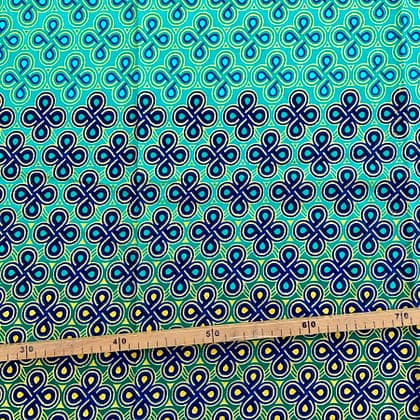 Tissu Wax pailleté vert turquoise imprimé Noeuds