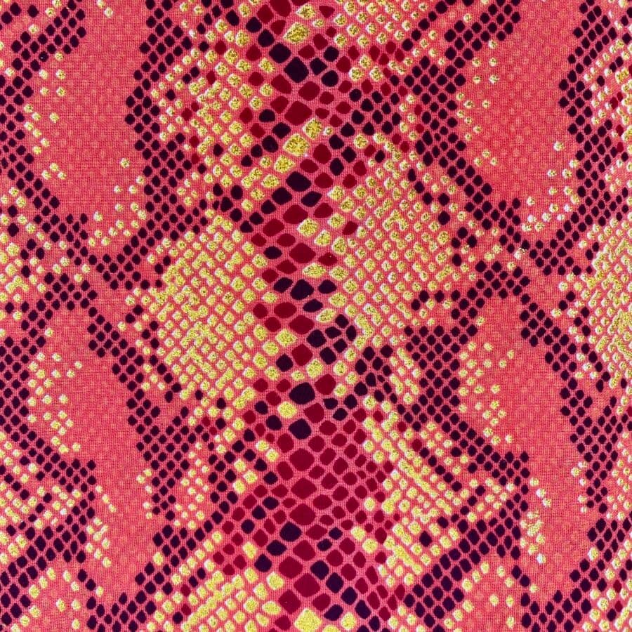 Tissu Wax pailleté orange imprimé Python détail