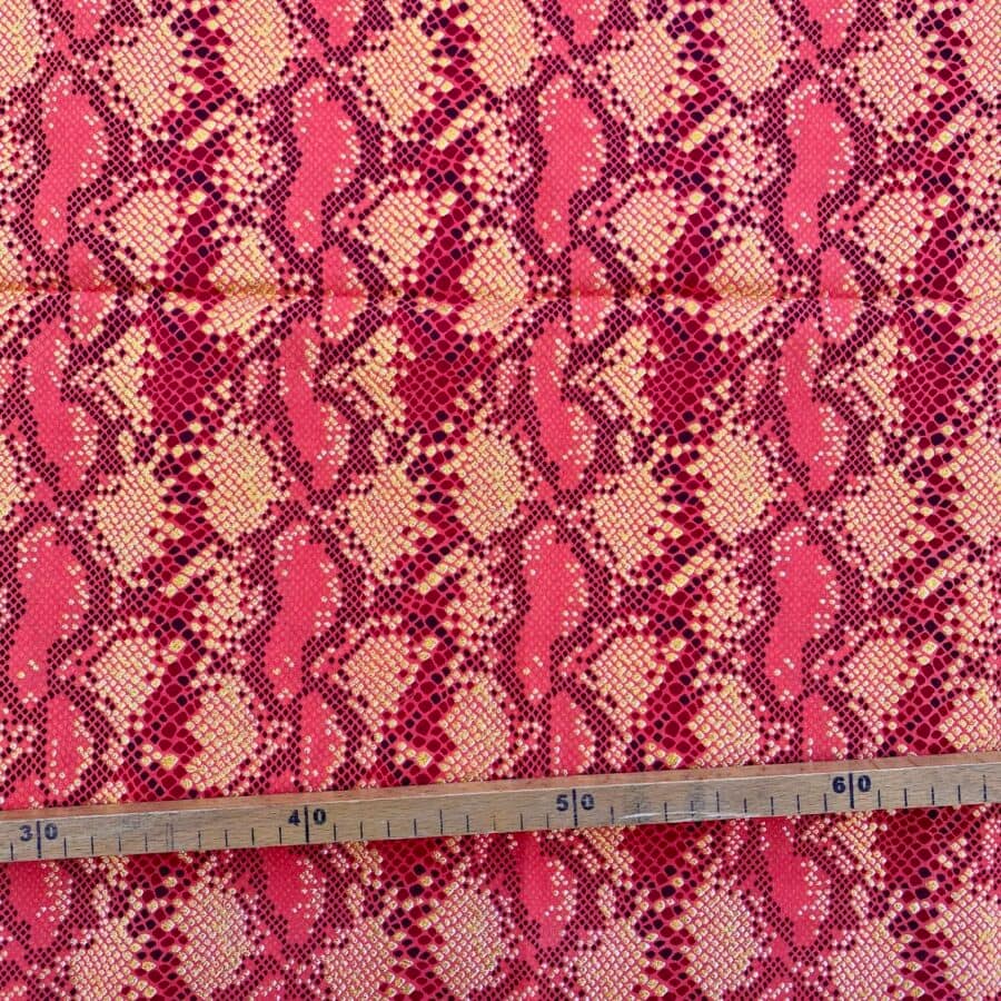 Tissu Wax pailleté orange imprimé Python