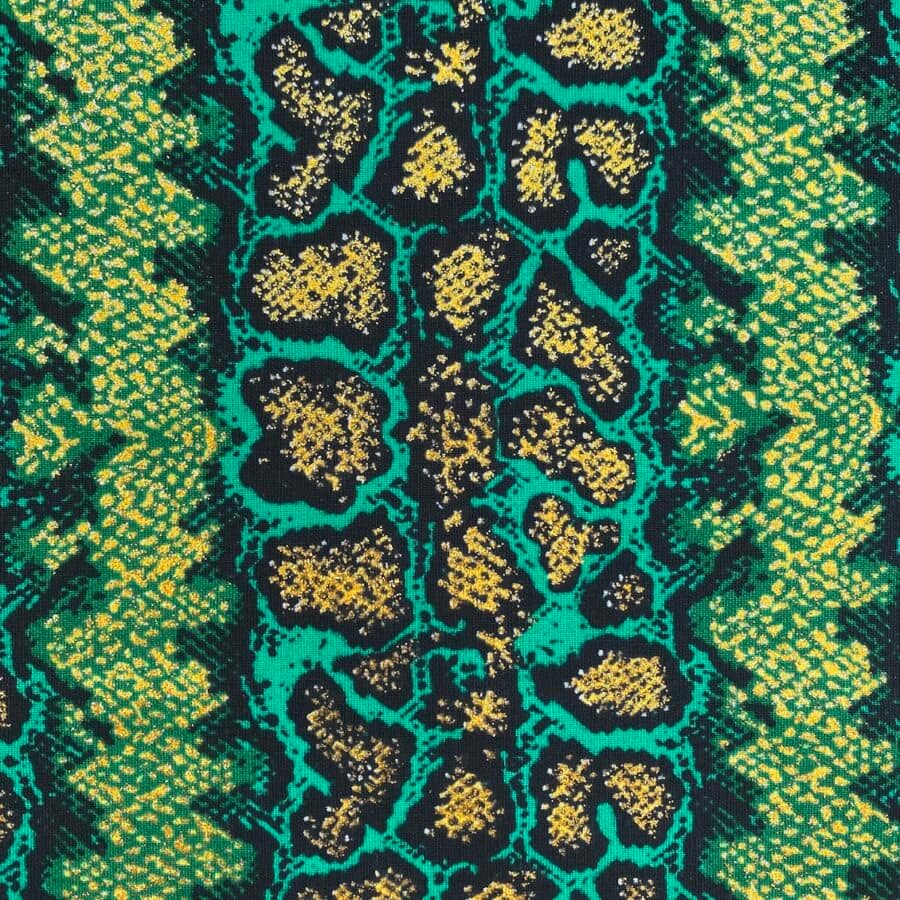 Tissu Wax pailleté vert imprimé Crotale détail