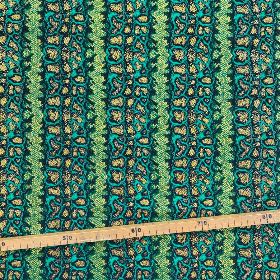 Tissu Wax pailleté vert imprimé Crotale